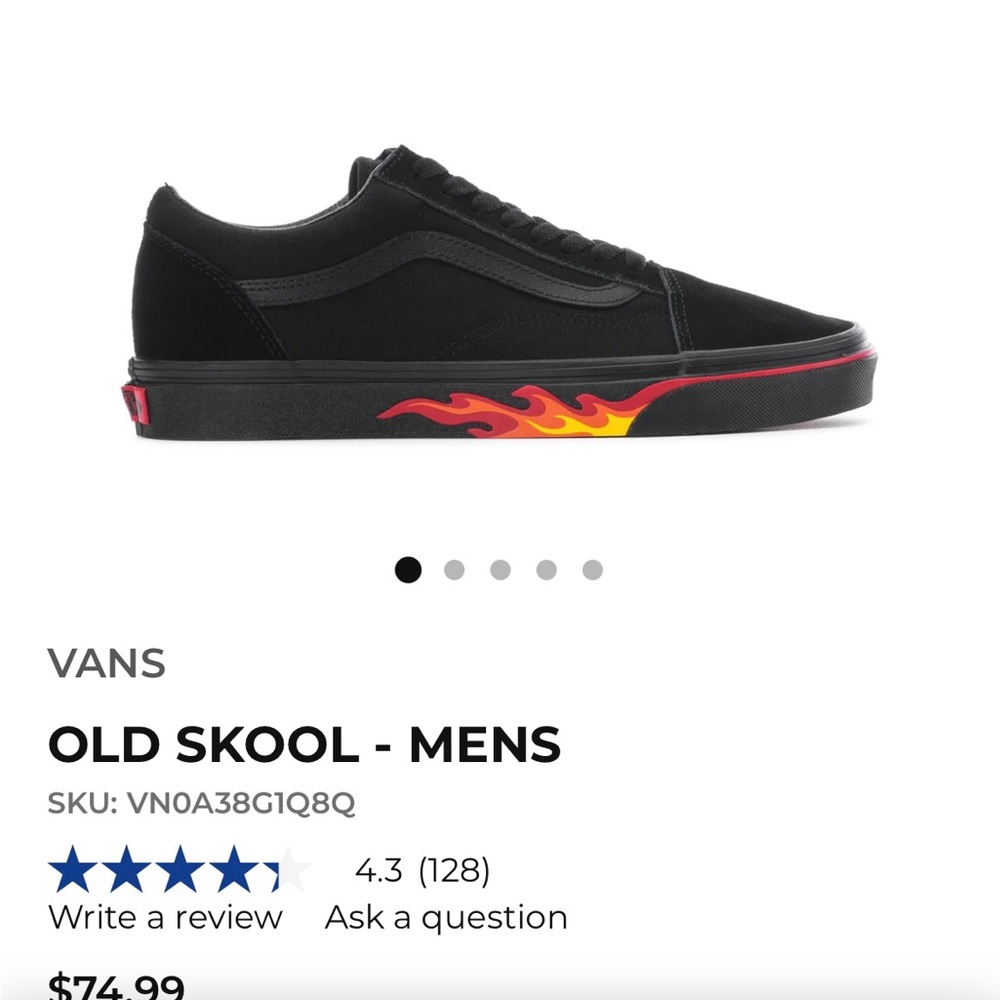 Old Skool Black Vans w/ flames on the sides. Size 11.5